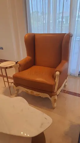 Elegant Wingback Chair with Coffee Table