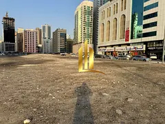 Commercial land for sale in Sharjah, Al Khan, directly on the Corniche. Ownership available to UAE n