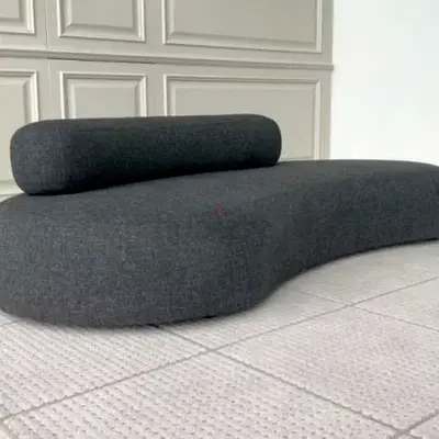 Contemporary Dark Grey Curved Sofa – Unique Design  Comfort