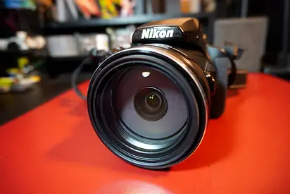 Nikon Coolpix P900 + spare battery, lens protector, and bag