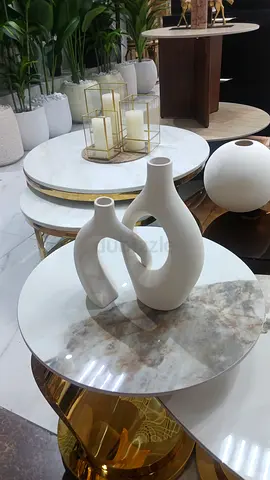 Elegant White Ceramic Vase on a Stylish Table