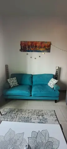 Stylish Turquoise Sofa for sale