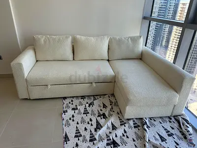 IKEA L-shape sofa com bed with storage