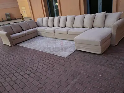 Hillared beige U shape sofa bed with mattress