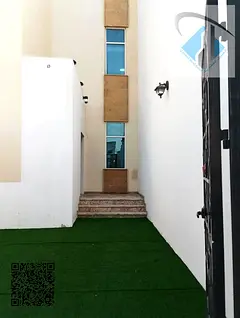 Villa for sale opposite the mosque, including water, electricity, and air conditioning. Freehold own