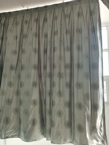 Elegant Light Grey Curtains with Artistic Design