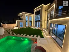 A luxurious villa in one of Ajman's most prestigious areas, complete with a private pool, electr