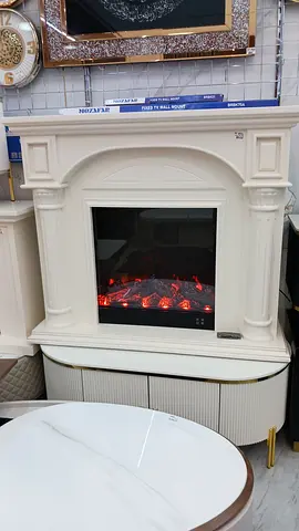 Elegant White Electric Fireplace with Classic Detailing