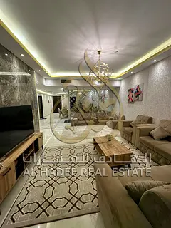 For rent in Al Khan - Two bedrooms and a living room furnished + free parking + free gym and swimmin