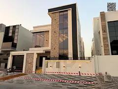 For sale: Modern villa in Al Yasmin, Ajman. Two floors + roof, 5 master bedrooms with a swimming poo