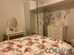 Fully Furnished Duplex 1BR with Modern Kitchen and Living Space
