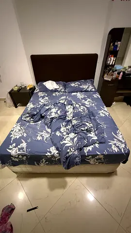 Comfortable Queen Size Bed with Floral Bedding