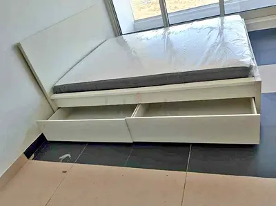 IKEA malam queen‑size bed (160 × 200 cm) with 2 storage drawers underneath and an IKEA mattress