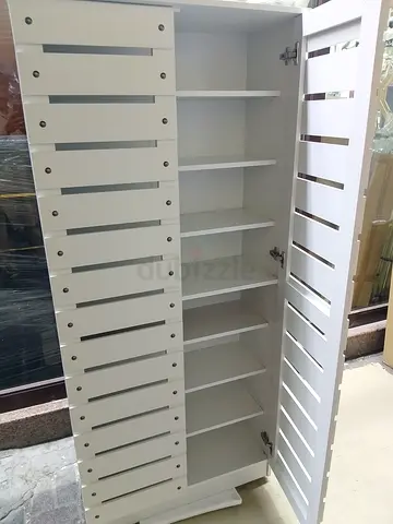 Stylish White Storage Cabinet with Striped Design