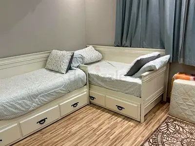 2 Single Beds with Pull-Out Storage + 3 Mattresses – Very Good Condition