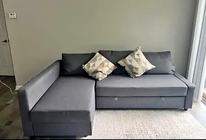 Ikea L Shape Sofa cum bed with big storage in L