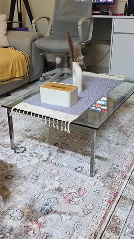 Stylish Glass Coffee Table with Vintage Rug