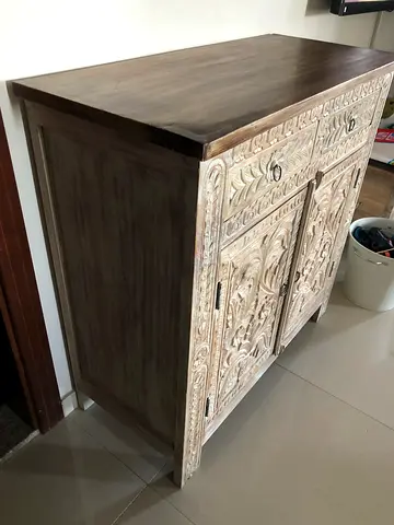 Handcrafted Wooden Cabinet with Intricate Carvings