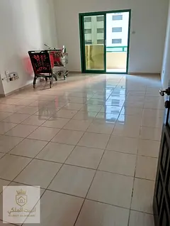 A well-maintained apartment for rent in Al Taawun area, featuring two bedrooms and a spacious living