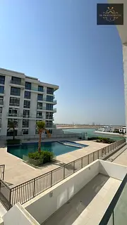 🌊 Brand New 1-Bedroom Apartment with Stunning Pool View | Ajmal Makan Waterfront, Sharjah 🏙️