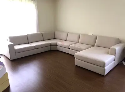 Looking Great Condition Home Center eterno U Shape Sofa Beige