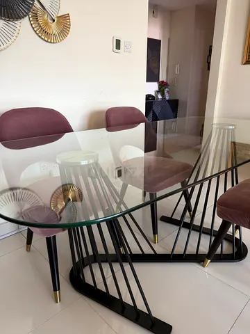 Stylish Glass Dining Table with Elegant Chairs