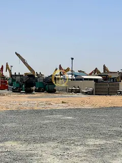 Warehouse for sale in Al Sajaa Industrial City, Emirates Industrial Estate, freehold ownership for A