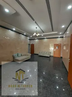 Al-Zahia apartment for annual rent, rooms, hall, bathroom, balcony, central air conditioning, insura