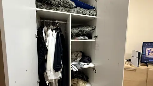 Spacious White Wardrobe with Shelves and Hanging Rods