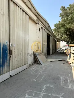 For sale: a developed land in Al-Sajaa Industrial Area, consisting of a commercial-residential build