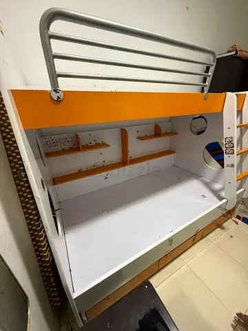 Kids bunk bed with storage