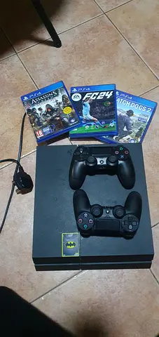 Ps4 with games + 2 controllers for 650