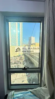 Apartments for sale in Capital Tower, Al Majaz 2. Two bedrooms, living room, kitchen, three bathroom