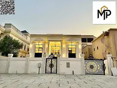 For Sale: Luxurious two-story villa with a rooftop terrace in Al Yasmeen, Ajman. Prime location near