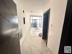 Two-bedroom apartment with a living room and three bathrooms for rent in Al Muwaihat 2.