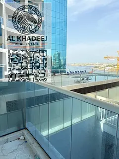 Two-bedroom apartment with a living room, furnished, for annual rent in Al Waha Towers, Ajman, near