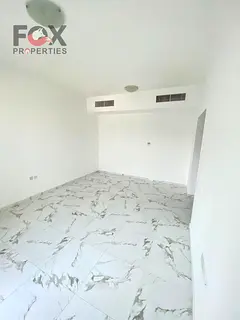 For annual rent in Ajman, Al Rashidiya 2 area, opposite the Ladies' Park: Two bedrooms and a liv