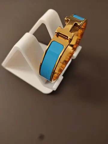 Elegant Gold and Turquoise Bracelet Hermes