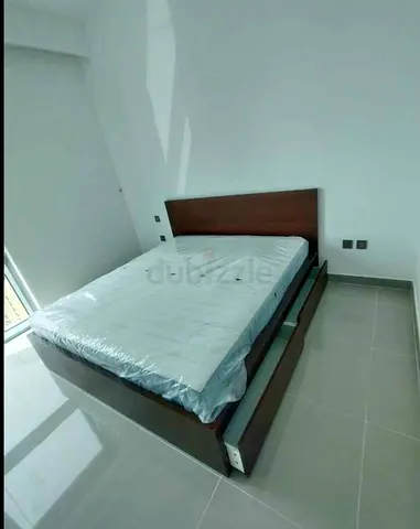 IKEA malam king‑size bed (180 × 200 cm) with 2 storage drawers underneath and an IKEA mattress