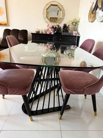 Elegant Glass Dining Table with Stylish Velvet Chairs