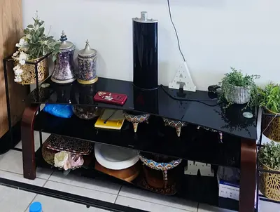 Elegant Black Console Table with Decorative Accessories