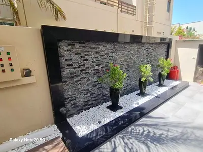 Elegant Outdoor Water Feature with Planters