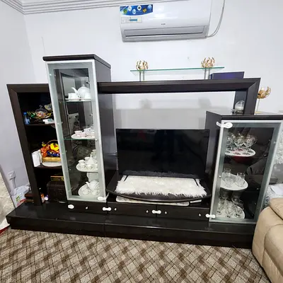 Modern Glass-Front Cabinet with Stylish Decor size W2.5 x D 0 .5 x  H 2.1 meters