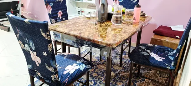 Stylish Dining Table Set with Elegant Floral Chairs