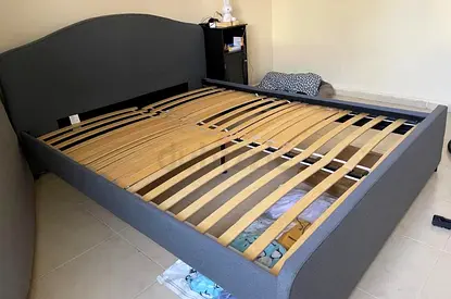 Stylish Gray Bed Frame with Wooden Slats