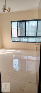 Three-bedroom apartment with a living room for annual rent in Al Majaz 3, prime location and excelle