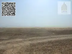 Two adjacent plots of land for sale in Masfout, Block 11