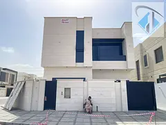 Villa for sale in Ajman, Al Yasmin area. 6 master bedrooms, majlis, 2 living rooms, maid's room,