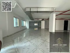 office or commercial floor in Al Muwaihat 3, within a new building in a prime location ideal for com