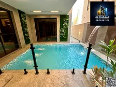 Villa in Al-Amrah area, 7 rooms with swimming pool and roof, including electricity, water and air co